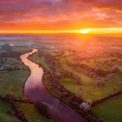 “Watching a River Pass Under”